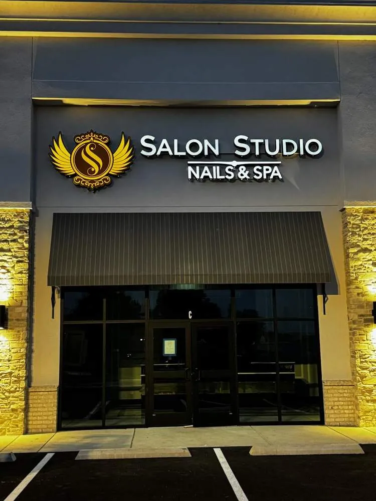 Lit storefront sign